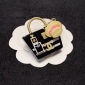 Replica Chanel Acrylic hat bag brooch