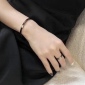 Replica Chanel letter double C stainless steel black color preserving series modeling ring