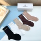 Replica Balenciaga's new gold bronzed midtube women's socks