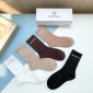 Replica Balenciaga's new gold bronzed midtube women's socks