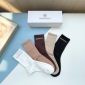 Replica Balenciaga's new gold bronzed midtube women's socks