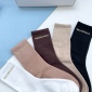 Replica Balenciaga's new gold bronzed midtube women's socks