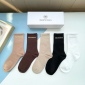 Replica Balenciaga's new gold bronzed midtube women's socks