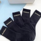 Replica Balenciaga's new gold bronzed midtube women's socks