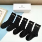 Replica Balenciaga's new gold bronzed midtube women's socks