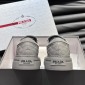 Replica Prada Enamelled triangular metal logo sneaker