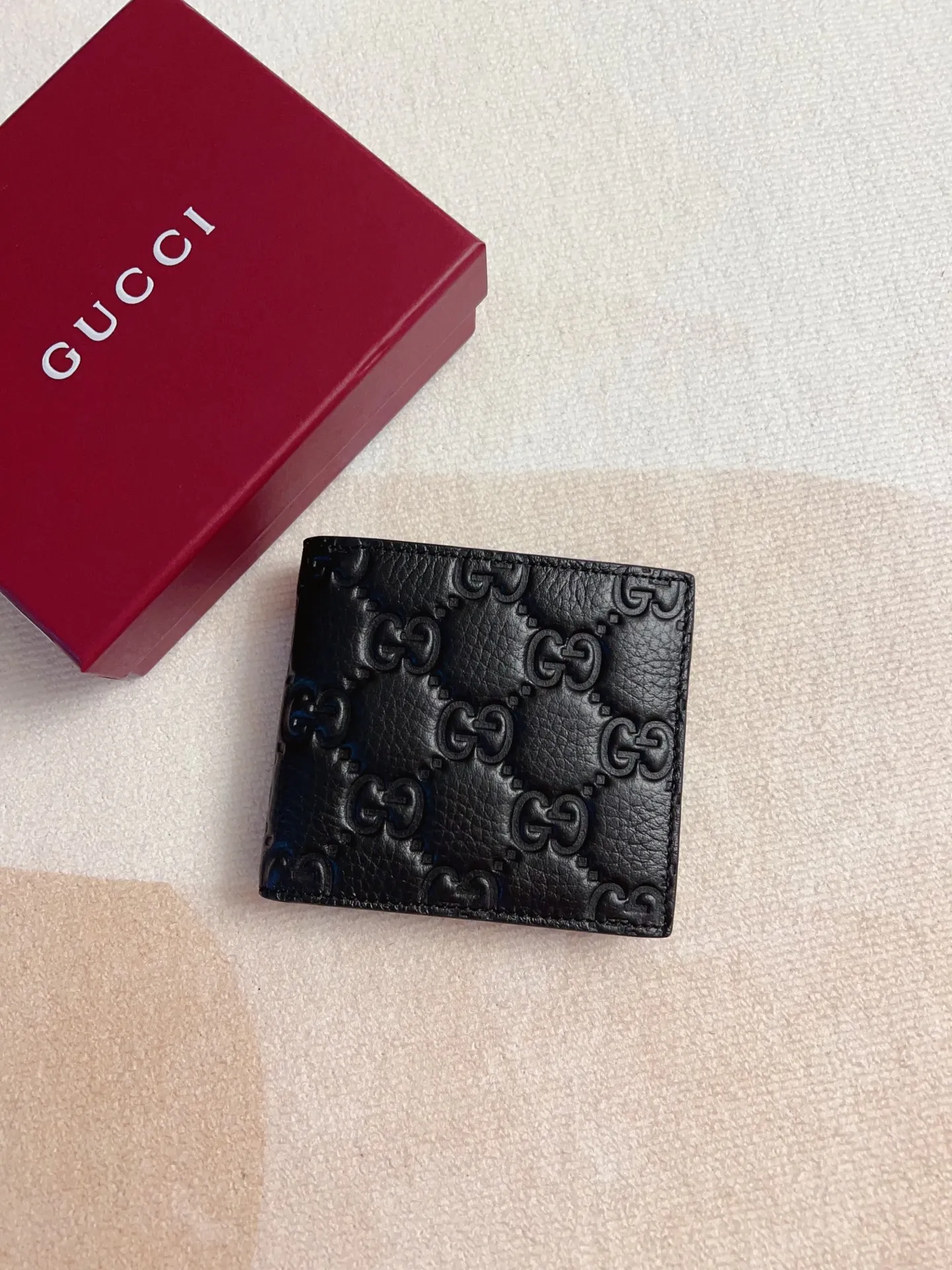 Gucci GG Emblem 黒 超柔らか財布 835002