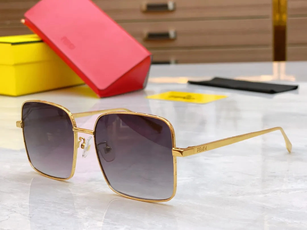 FENDI ゴールドカラーサングラスモデルFE50063