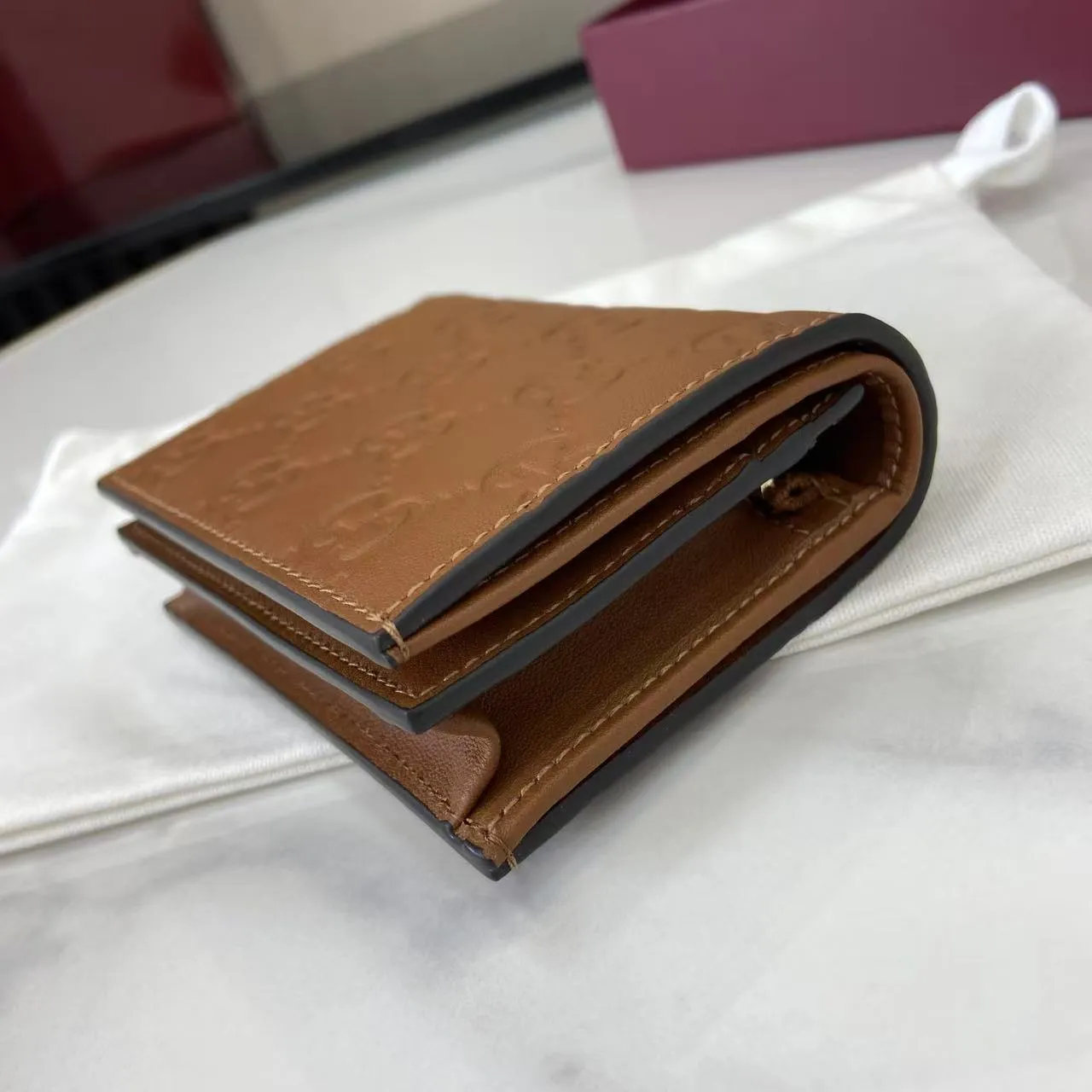 グッチ GGエンブレム スモールウォレット ブラウン エンボス加工 - 画像 (14)