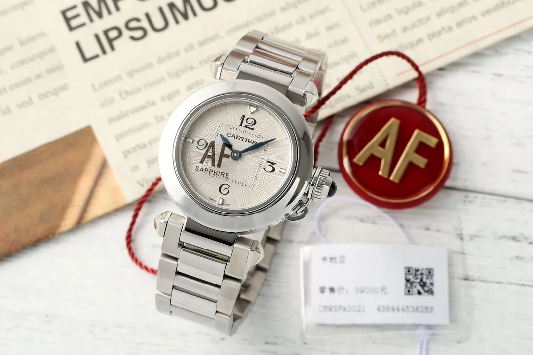 Cartier Pasha de Cartier Stainless Steel Automatic Watch with White Dial, Blue Hands, and Sapphire Crystal - Silver Tone Bracelet