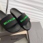 Replica Balenciaga Pool Slides in black with green logo