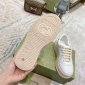 Replica Gucci - GG embossed low-top sneakers