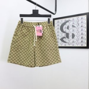 Gucci & The North Face Shorts in Brown