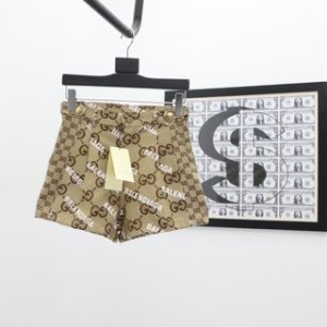 Gucci & Balenciaga Shorts Cotton in Brown