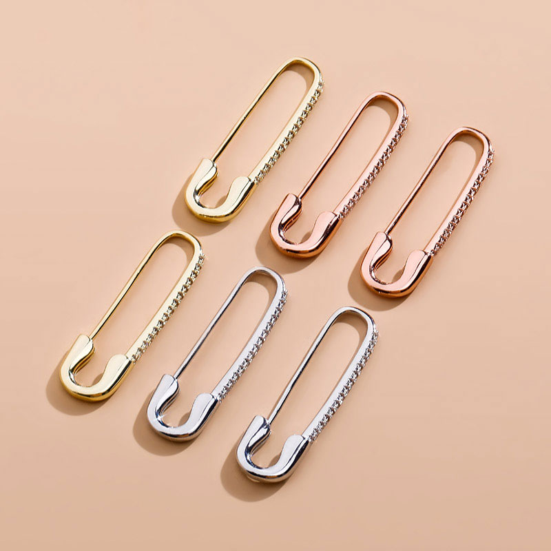 Iced Out Safety Pin Earrings Gold With Street Luxury Shine - Image 4