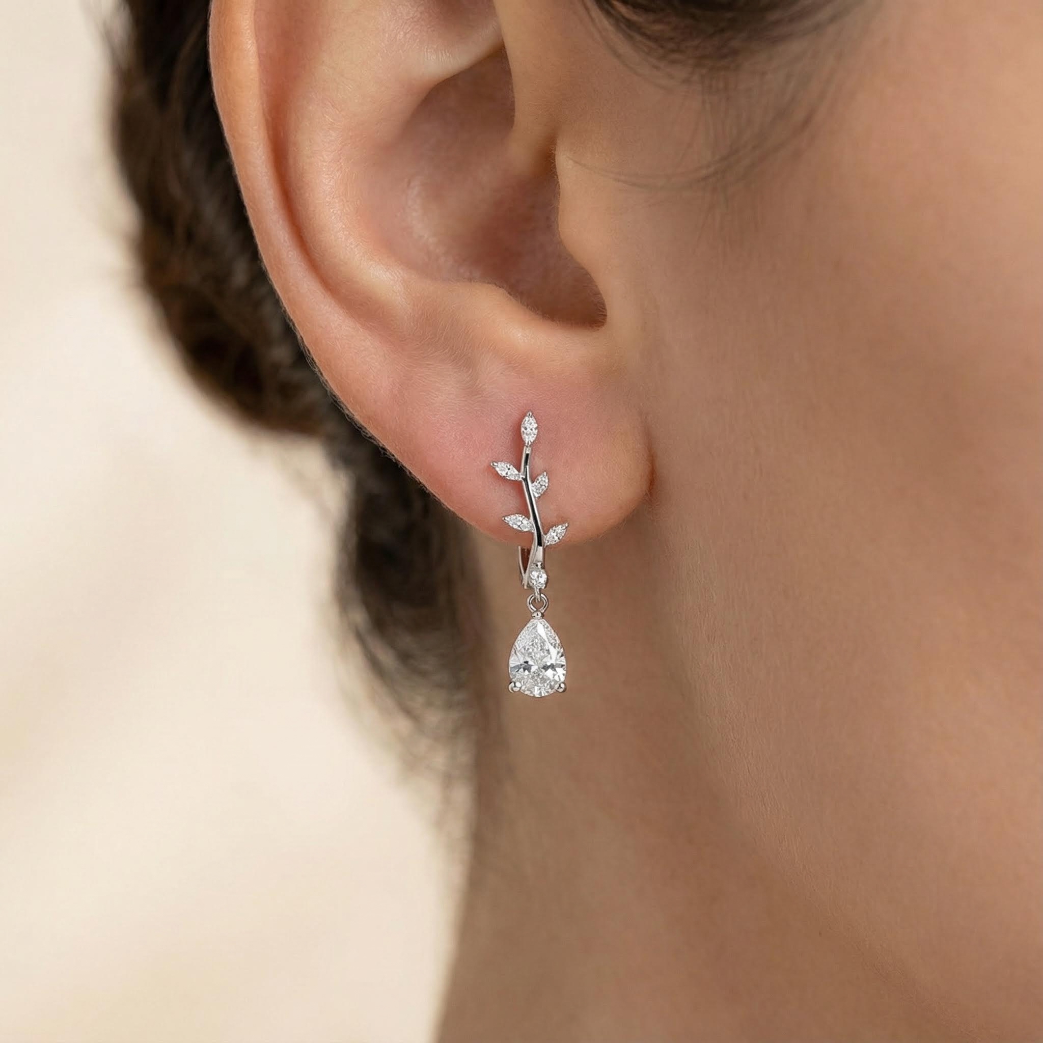 Pear Cut Vvs Moissanite Leafy Stud Earrings With Street Luxury Shine - Image 5
