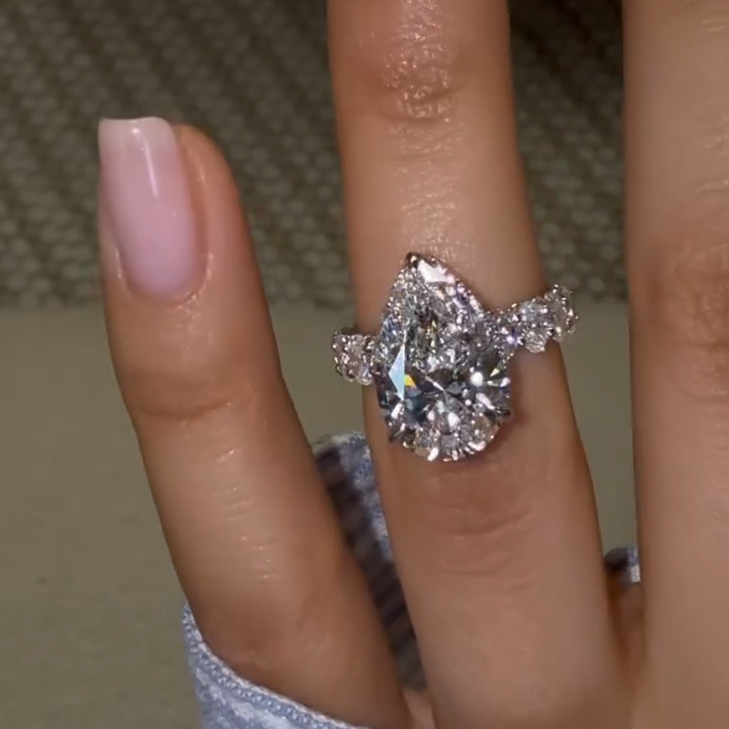 7.71ct. Tw. Pear Cut Vvs Moissanite Pave Engagement Ring Iced Out