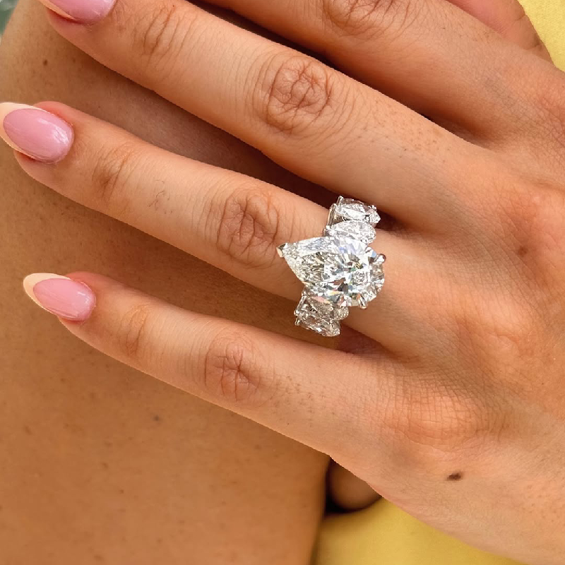 5.57ct. Tw. Pear Cut Vvs Moissanite Pave Engagement Ring Iced Out