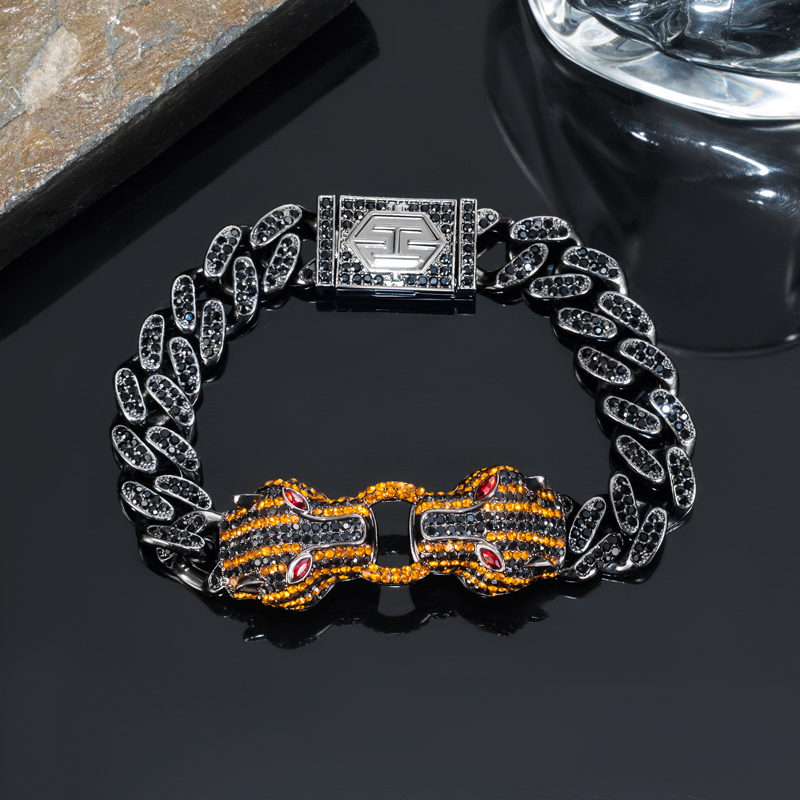Bold Iced Out Double Orange Panther Cuban Bracelet In 18k Black Gold
