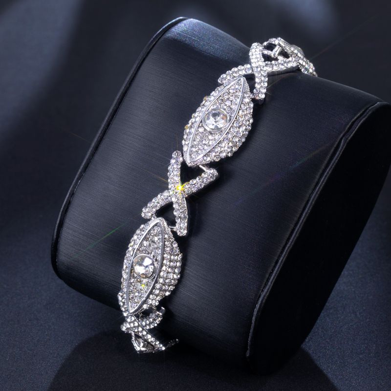 Iced Out Evil Eyes With Infinity Bracelet In Gold With Street Luxury Shine - Image 4