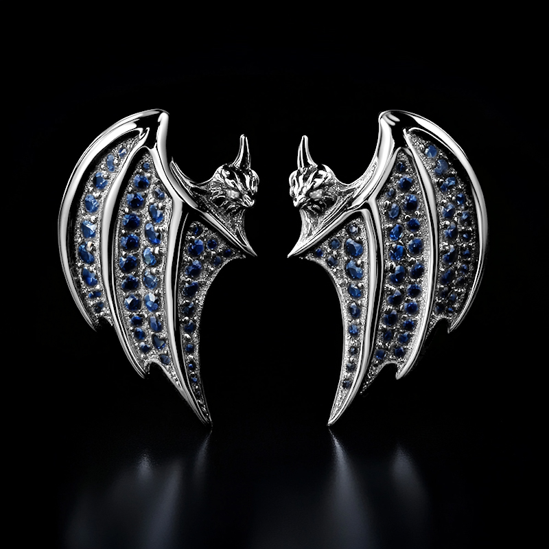 Royal Blue Sapphire Bats Stud Earrings In Black Gold With Gold Shine