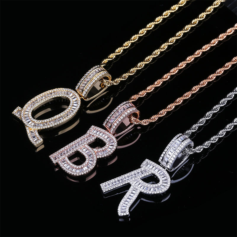 Iced Out Baguette Letters Pendant In Gold With Street Luxury Shine - Image 3