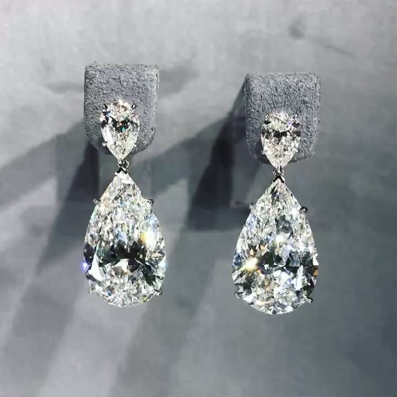 Captivating Pear Cut Drop Earring In Sterling Silver With Silver Shine